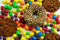 colourful candies, cookies and donuts top view, unhealthy lifestyle and diet concept