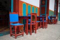 Colourful chairs in El Jardin