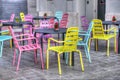 Colourful chairs in Valencian cafe, Spain