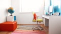 Colourful children rooom with white walls and furniture