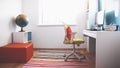 Colourful children rooom with white walls and furniture