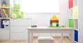 Colourful children rooom with white walls and furniture