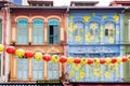 Colourful Chinese shophouses and lanterns in Pagoda street, Chinatown, Singapore