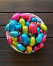 colourful chocolate Easter eggs in bowl  on table Royalty Free Stock Photo