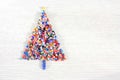 Colourful Christmas tree made of beads background