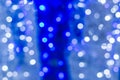 Colourful of city night lights blurred bokeh background. Defocused abstract blue christmas texture Royalty Free Stock Photo