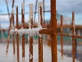 Colourful close up of rebar or metal rods to link foundations.