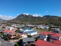 Small coastal town nestled nearby a beautiful mountain range