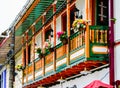 View on Colourful colonial style wooden balconies in Filandia Colombia