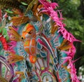 Colourful costume headress.