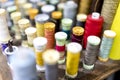 Colourful cotton bobbins and thread in a tailors shop