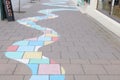 Colourful curving pattern on a street in Reykjavik