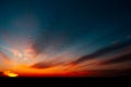 Colourful dark sunset of red and blue colours. Dramatic landscape of sunrise Royalty Free Stock Photo