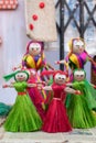 Colourful decorative wall hangings, dolls made of jute, handicrafts for sale Selective Focus Royalty Free Stock Photo