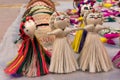 Colourful decorative wall hangings, dolls made of jute, handicrafts for sale Selective Focus Royalty Free Stock Photo