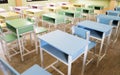 Colourful desk in class room on afternoon