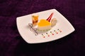 Colourful dessert at restaurant, mix fruits cake and macaron