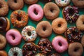 Colourful Donuts background. Top view of assorted glazed donuts.