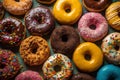 Colourful Donuts background. Top view of assorted glazed donuts.