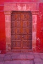 Doorway in a colourful red wall