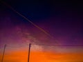 Colorful dusk sky electric wires Royalty Free Stock Photo