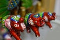 Colourful elephant toys with decoration, indian style on white background.