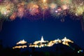 Colourful firework display for celebration with blur city bokeh