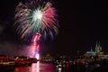 Colourful firework in front of the cathedral of Cologne