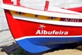 Albufeira Beach colourful fishing boat