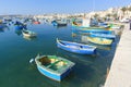 Colourful fishing boats in island harbour Royalty Free Stock Photo