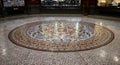 Colorful circular mosaic tiling inside Victorian shopping mall of historic Block Arcade in Melbourne CBD, Australia