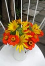 Colourful flower from garden in white vase