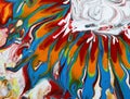 Colourful fluid art painting on canvas like flower