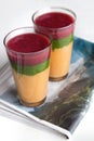 Colourful Fruit Smoothies on Newspaper