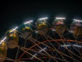 A colourful Giant wheel at amusement park illuminated at night Royalty Free Stock Photo