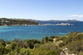 Colourful View of the Rugged Coastline and Eroded Rocks of Northern Sardinia With the Islands of La Maddalena & Isola Caprera. Bai Royalty Free Stock Photo