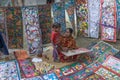 Colourful handicrafts are being prepared for sale in Pingla village by Indian rural woman mother worker. Royalty Free Stock Photo