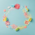 Colourful handmade tropical paper flowers and leggs on blue pastel background with copyspace, seasonal easter wreath, summer