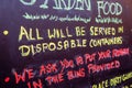 Colourful handwritten rules and information on a chalkboard at a pub that recently reopened with the easing of the coronavirus