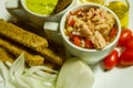 Colourful, healthy foods Avocado dip, Brown Toast with Olive Oil, Apple Cider Vinegar, Cherry Tomatoes, Onion with Tuna for