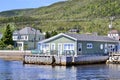 Colourful homes and forested landscape along Bonne Bay