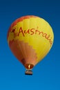 A colourful hot air balloon and clear blue sky