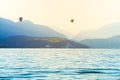 Colourful Hot air balloons flying over Annecy lake