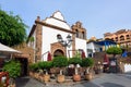 Colourful houses and palm trees on street in Adejec town, Tenerife, Canary Islands, Spain Royalty Free Stock Photo