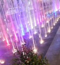 Colourful illuminated light fountain at night