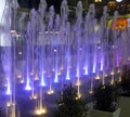 Colourful illuminated light fountain at night