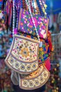 Colourful Indian bags hanging for sale at the market