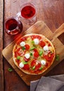 Colourful Italian tricolor pizza with red wine Royalty Free Stock Photo