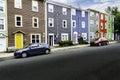 Colourful Jelly bean homes painted in different colours at a harbour city in Atlantic Canada.