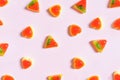 Colourful Jelly, pizza and heart shape on pastel pink background
